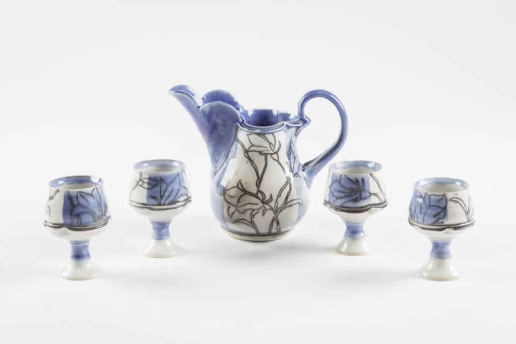 Geranium Goblets. Porcelain, fired in reduction to cone 9. March 2016. By Nikki Navaille.